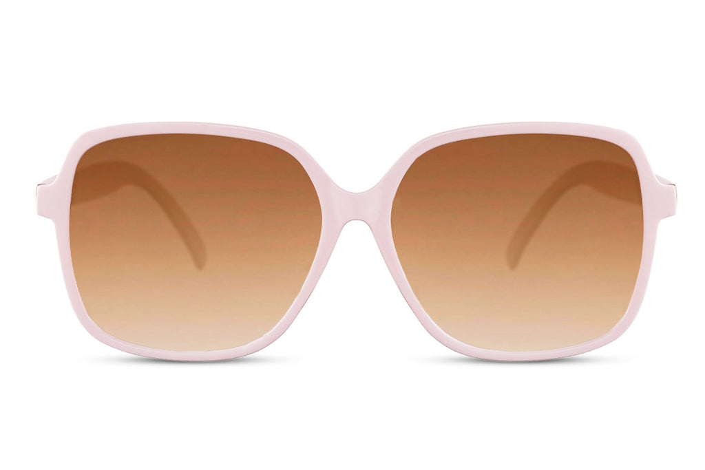 Pink sunglasses with brown gradient lenses on a white background
