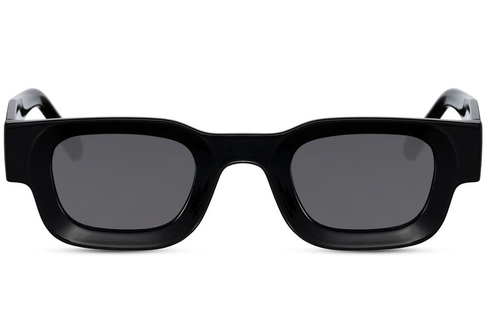 Black sunglasses with dark lenses on a white background Black