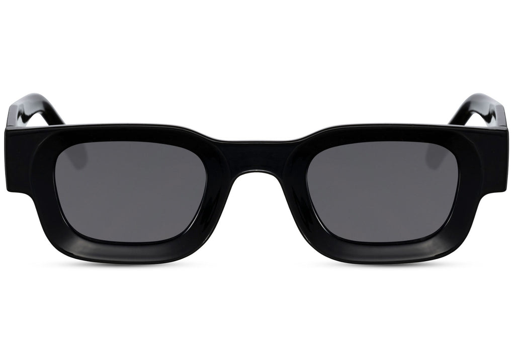 Black sunglasses with dark lenses on a white background Black