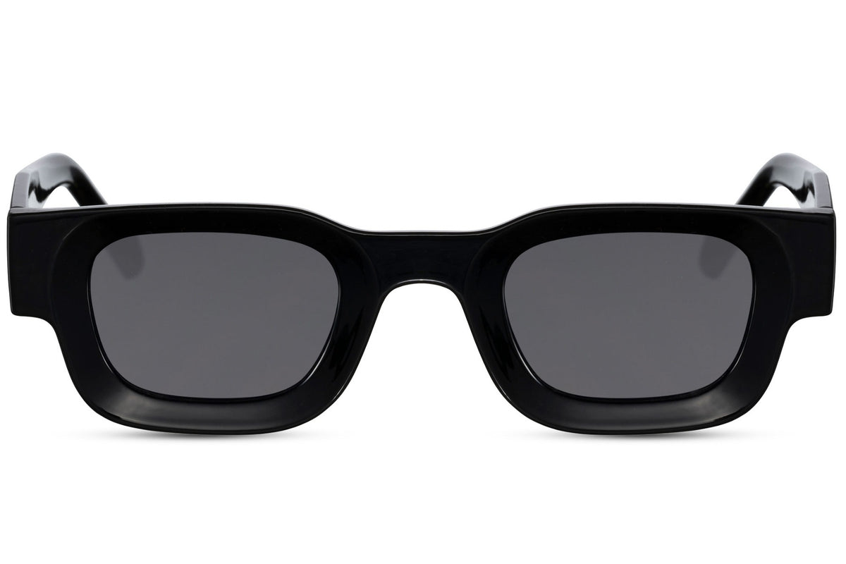 Black sunglasses with dark lenses on a white background Black