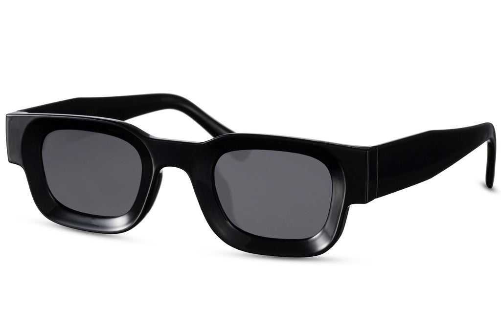 Black sunglasses with dark lenses on a white background Black