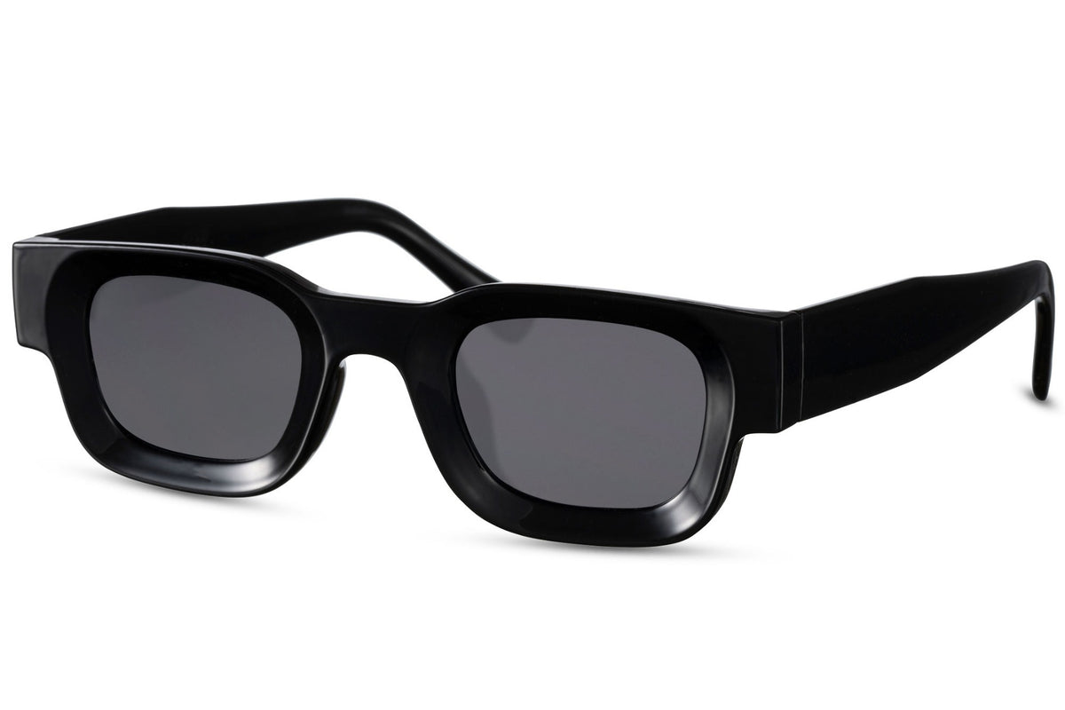 Black sunglasses with dark lenses on a white background Black