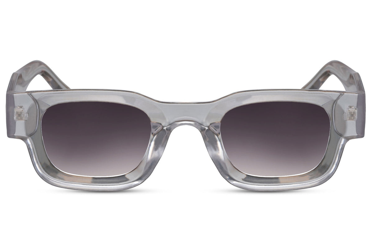 Clear frame sunglasses with dark lenses on a white background Clear