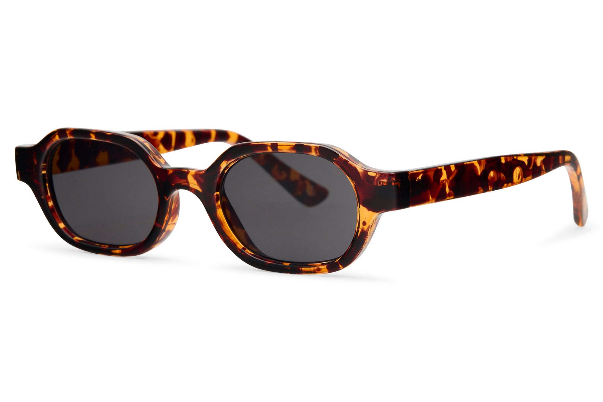 Sunglasses with tortoiseshell frame and dark lenses on a white background tortoiseshell