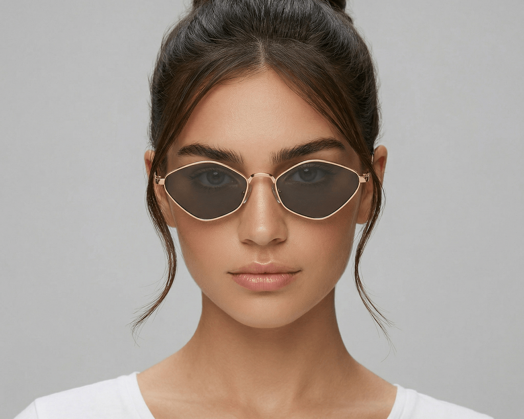 Woman wearing sunglasses with a plain background Black